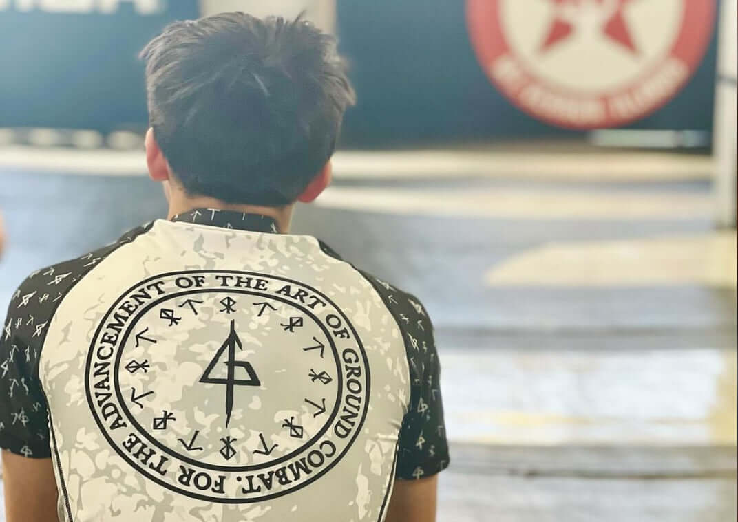 Jiu-Jitsu athlete in Go Forth "White Ranked" Rashguard